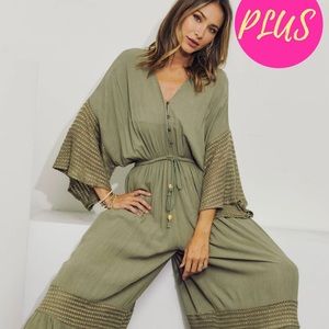 Plus size romper in sage green with absolutely gorgeous detail.